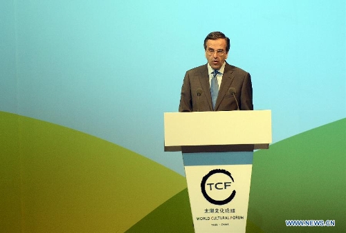 Greek Prime Minister Antonis Samaras delivers a speech at the opening ceremony of the second World Cultural Forum (Taihu, China) in Hangzhou, capital of east China's Zhejiang Province, May 18, 2013. Established in 2007 as a non-governmental organization based in China, the World Cultural Forum (Taihu, China) is committed to creating an open, multilateral and inclusive platform for international cultural exchanges. (Xinhua/Han Chuanhao) 