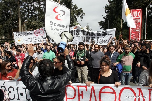 Ordinary Cypriots step in the streets to protest against the massive 