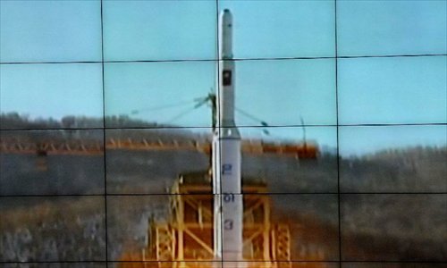 Photo released by the official KCNA news agency of the Democratic People's Republic of Korea (DPRK) on December 12, 2012 shows the Unha-3 carrier rocket launching with the satellite Kwangmyongsong-3, on a monitor screen at the satellite control center. According to the KCNA, the second version of Kwangmyongsong-3 was launched by an Unha-3 carrier rocket at 9:49 a.m. local time (0049 GMT) Wednesday from the Sohae Space Center in Cholsan County, North Phyongan Province, and entered the preset orbit. Photo: Xinhua