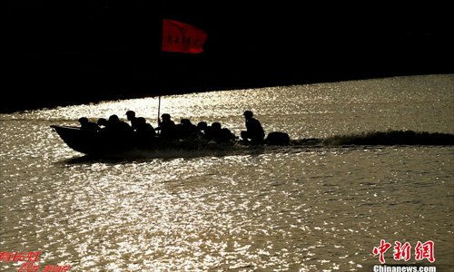 Chinese marines soldiers attend an exercise during a marines landing drill at their base in Zhanjiang, Guangdong province, December 23, 2012. The Marine Corps under the PLA Navy's South China Sea Fleet kicked off the tactical exercise of the landing drill at their base in Zhanjiang, Guangdong province, December 23, 2012. Source: Chinanews.com