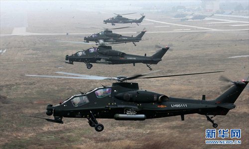 An army aviation brigade under the Nanjing Military Area Command (MAC) of the Chinese People's Liberation Army (PLA) organizes a helicopter flight training, in a bid to temper the tactical skills of the pilots and the helicopter operation-and-control capability. (Xinhua/Guo Weihu)
