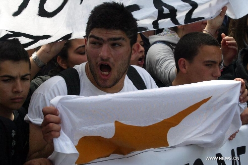 Ordinary Cypriots step in the streets to protest against the massive 