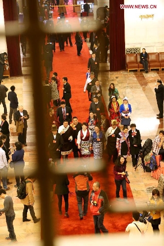   Members of the 12th National Committee of the Chinese People's Political Consultative Conference (CPPCC) arrive at the Great Hall of the People in Beijing, capital of China, March 12, 2013. The first session of the 12th CPPCC National Committee concluded here on Tuesday. (Xinhua/Liu Weibing)