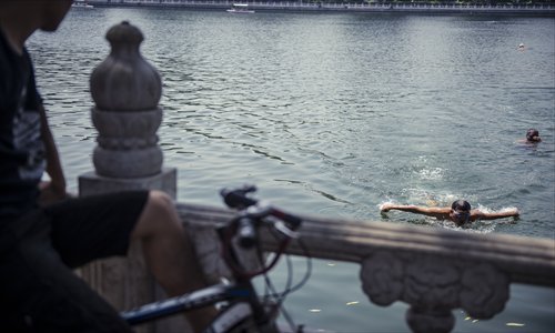 No longer a major commerce route, the Grand Canal's Houhai segment sees many swimmers.