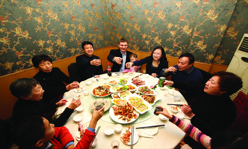 Family gatherings during Spring Festival can be a happy, toast-filled time if you know what to expect. Photo: CFP