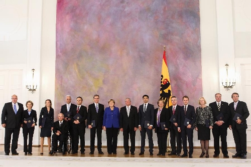 german chancellor angela merkel and cabinet officially