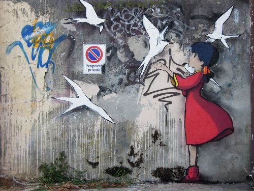 Kenny Random, a street artist in Italy, has been reportedly obsessed by painting graffiti that feature 