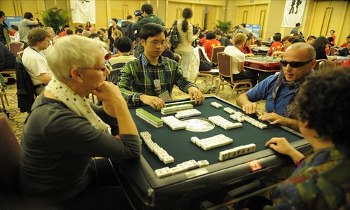 Players from around the world compete at the Third World Mahjong Championship held in Chongqing last October. Photo: CFP