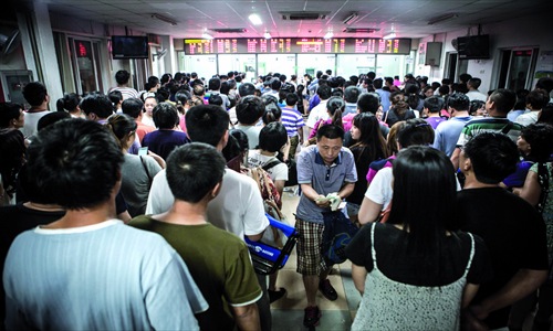A male patient who has just made his appointment makes his way to the exit.


