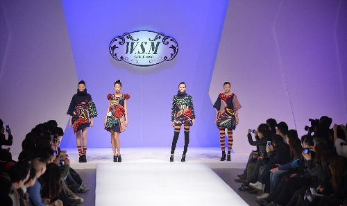 &nbsp;Models present creations in the WSM China Knitwear Fashion Design Contest 2013 during the China Fashion Week in Beijing, capital of China, March 26, 2013. The design by Sheng Lina from Fashion School & Engineering of Zhejiang Sci-Tech University won the championship of the contest. (Xinhua/Li Xin) 