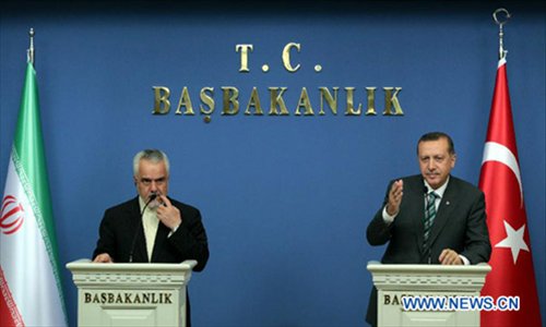 Turkish Prime Minister Recep Tayyip Erdogan (R) speaks during a joint press conference with visiting Iran's First Vice-President Mohammed Reza Rahimi in Ankara, capital of Turkey, October. 4, 2012. Erdogan said on Thursday that they wanted only peace and security in the region with no intention for a war. Photo:Xinhua/Anatolia News Agency