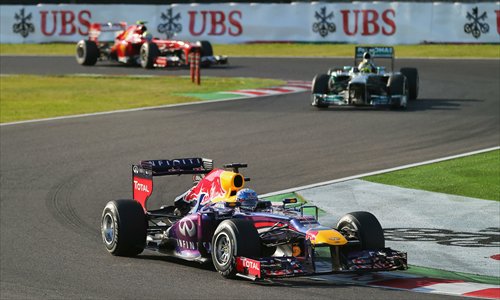 Red Bull Racing's Sebastian Vettel of Germany drives on his way to winning the Japanese Formula One Grand Prix at Suzuka Circuit on October 13 in Suzuka, Japan. Photos: CFP