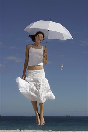 Functional and stylish parasols offer skin protection to Shanghai fashionistas. Photos: IC and CFP