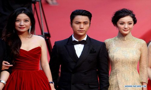 Crew members of film Painted Skin attend the 15th Shanghai International Film Festival in Shanghai, east China, June 16, 2012. Photo: Xinhua 