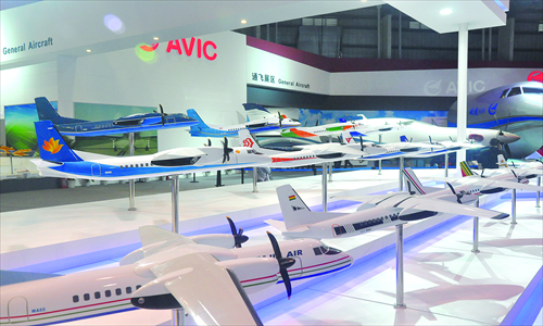 Models of China's Modern Ark 60 (MA60) passenger aircraft, painted as they appear in different countries. Photo: Xu Tianran/GT