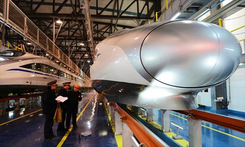 High speed trains await maintenance work at Zhengzhou Railway Station. The Beijing-Zhengzhou high speed railway will go into operation on Wednesday. Photo: CFP