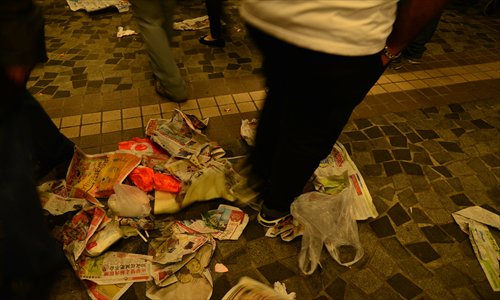 Litter lies on the ground after visitors left a fireworks viewing point near the Hong Kong Arts Centre on February 10, 2013. Photo: IC
