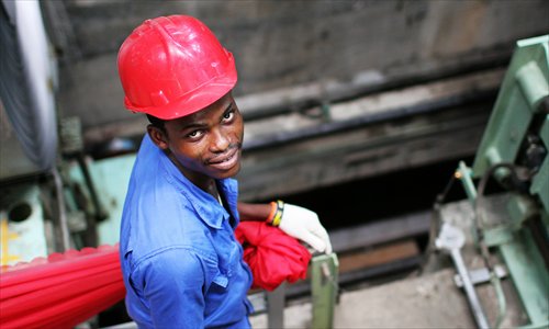 A local hired by a Chinese company works in a steel mill in Nigeria on April 18. Photo: CFP