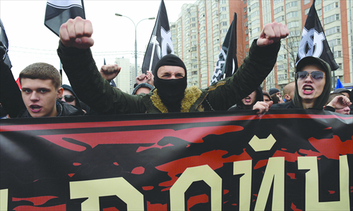Russian ultra-nationalists shout slogans during the so-called