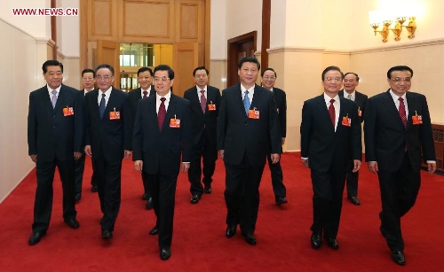 Hu Jintao, Xi Jinping, Wu Bangguo, Wen Jiabao, Jia Qinglin, Li Keqiang, Zhang Dejiang, Yu Zhengsheng, Liu Yunshan, Wang Qishan and Zhang Gaoli walk to the venue for the opening meeting of the first session of the 12th National People's Congress (NPC) at the Great Hall of the People in Beijing, capital of China, March 5, 2013. The first session of the 12th NPC opened in Beijing on March 5. (Xinhua/Lan Hongguang)Special Report: NPC, CPPCC Annual Sessions 2013