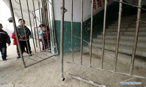 Photo taken on Feb. 27, 2013 shows the scene of a stampede accident at the Qinji Elementary School in Xueji County of Xiangyang, central China's Hubei Province. Four students were killed in a stampede accident here on Wednesday morning. Relevant departments of Xiangyang have rushed to the scene to carry out rescue efforts, and the injured have been sent to hospital for treatment. The cause of the accident is under investigation. Photo: Xinhua