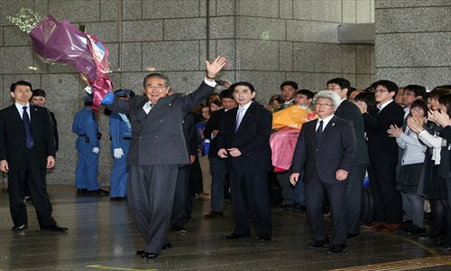 Tokyo Governor Shintaro Ishihara leaves the Tokyo city hall after his resignation on Wednesday to become the leader of a small right-leaning party. Photo: AFP