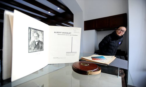 An architecture book once used by renowned architect Laszlo Hudec sits on display Tuesday at the Hudec Memorial Museum at 129 Panyu Road in Xuhui district. The museum has put 19 such items on display for one year to commemorate the 120th anniversary of Hudec's birth. Hudec was active in Shanghai from the 1920s to the 1940s, when he designed dozens of famous buildings, including the Park Hotel. Photo: Yang Hui/GT