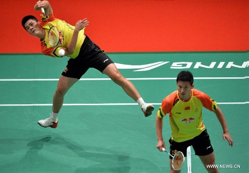 Cai Yun and Fu Haifeng (Rear) of China compete during the 2013 Sudirman Cup world mixed team badminton championship against Indonesia's Hendra Setiawan and Angga Pratama in Kuala Lumpur, Malaysia, on May 21, 2013. The Chinese pair won 2-1. (Xinhua/Chen Xiaowei) 