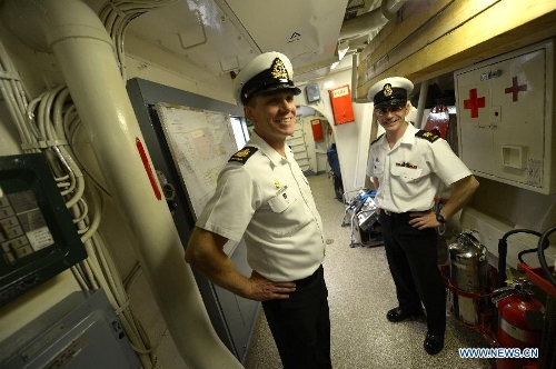 Chief Petty Officer First Class Norman Cawthra (L) and Chief Petty Officer Second Class Rene Tremblay are seen in the Royal Canadian Navy destroyer HMCS Algonquin during a media presentation in Vancouver, Canada, on April 26, 2013. Approximately 1,000 Canadian and American sailors are in Vancouver to meet members of the public and media to bring the Navy to the Canadians. (Xinhua/Sergei Bachlakov) 