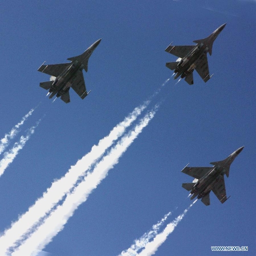 Fighter planes of the Indian Air Force fly in formation as part of the rehearsal for the Republic Day Parade in New Delhi, India, Jan. 21, 2013. The Republic Day Parade will be held on Jan. 26. (Xinhua/Partha Sarkar) 