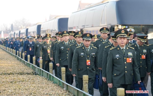 Deputies to the 12th National People's Congress (NPC) arrive at the Tian'anmen Square in Beijing, capital of China, March 5, 2013. The first session of the 12th National People's Congress (NPC) will open at the Great Hall of the People in Beijing on March 5. (Xinhua/Li Xueren)