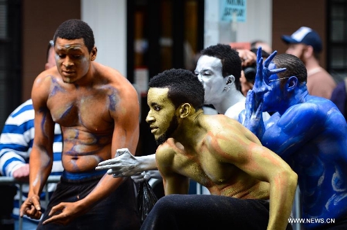 People participate in the annual Dance Parade in New York, on May 18, 2013. Over 200 dance groups showcasing 80 unique dance styles and cultures gathered from Broadway to the East Village on Saturday for the 7th Dance Parade in New York. (Xinhua/Niu Xiaolei) 