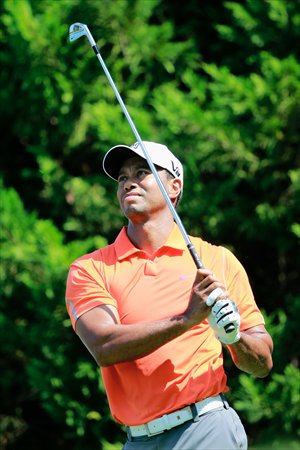 Tiger Woods watches his tee shot on the sixth hole during the first round of the Tour Championship at East Lake Golf Club in Atlanta, Georgia on Thursday. Photo: AFP