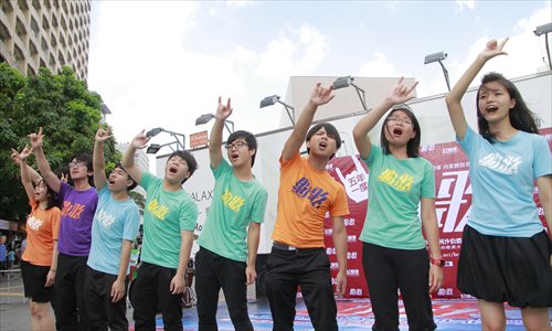 Fans honor Wong Ka-kui by singing Beyond's songs in Hong Kong on June 29. Photo: CFP