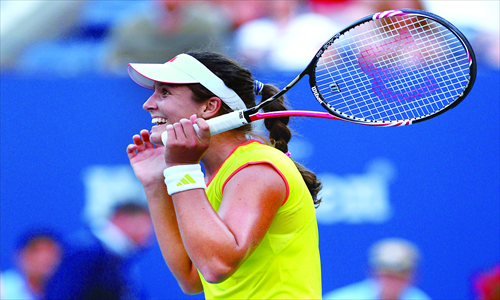 Laura Robson of Britain reacts after defeating Kim Clijsters of Belgium during their match on Wednesday. Photo: AFP 