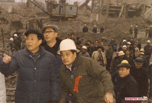 File photo taken in 1984 shows that Zheng Zhemin (1st L) works at the site of blasting demolition of Shijingshan Power Plant in Beijing, capital of China. Explosions expert Zheng Zhemin won China's top science award on Friday. Zheng, 88, is member of both the Chinese Academy of Sciences and the Chinese Academy of Engineering (CAE). Zheng has devoted himself to research in the areas of elastic mechanics, explosive processing and underground nuclear detonations. (Xinhua) 