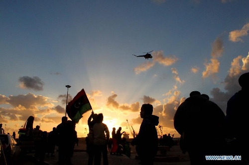  Libyan people attend a celebration for the second anniversary of the uprising that toppled the regime of strongman Muammar Gaddafi in Benghazi, on Feb. 17, 2013. (Xinhua/Mohammed El Shaiky) 
