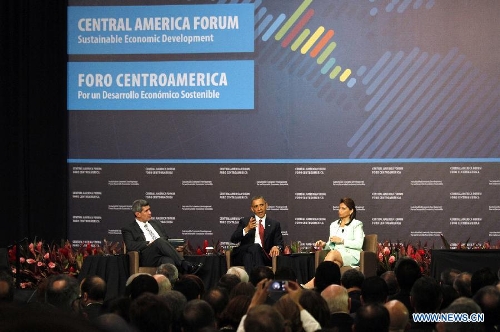 Costa Rica's President Laura Chinchilla (R), U.S. President Barack Obama (C), and Arturo Condo (L), director of the INCAE Business School, take part in the Central American Forum for a Sustainable Economic Development, in San Jose, capital of Costa Rica, on May 4, 2013. (Xinhua/Kent Gilbert)