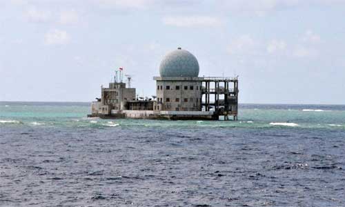 Photo taken on July 18, 2012 shows a building on Zhubi Reef of south China Sea. Photo: Xinhua