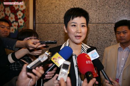 Li Xiaolin, a member of the 12th National Committee of the Chinese People's Political Consultative Conference (CPPCC), who is also the chairperson of the China Power International Development Limited, receives an interview in Beijing, capital of China, March 5, 2013. Women's presence in China's politics has been increasing in recent decades. The number of female deputies to the 12th National People's Congress and members of the 12th National Committee of the Chinese People's Political Consultative Conference (CPPCC) rise to 699 and 399, reaching 23.4% and 18.4% of the total respectively. (Xinhua/Wang Shen)  
