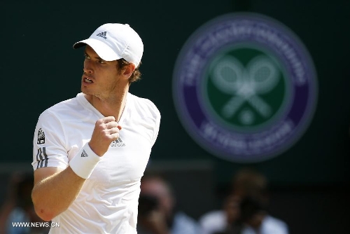 &nbsp;Andy Murray of Britain celebrates during the men's singles final with Novak Djokovic of Serbia on day 13 of the Wimbledon Lawn Tennis Championships at the All England Lawn Tennis and Croquet Club in London, Britain, July 7, 2013. Andy Murray on Sunday won his first Wimbledon title and ended Britain's 77-year wait for a men's champion with a 6-4 7-5 6-4 victory over world number one Novak Djokovic. (Xinhua/Wang Lili) 