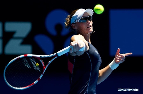 Samantha Stosur of Australia hits a return during her first round women's singles match against Chang Kai-Chen of Chinese Taipei on the first day of 2013 Australian Open tennis tournament in Melbourne, Australia, Jan. 14, 2013. Samantha Stosur won 2-0 to enter the next round. (Xinhua/Bai Xue) 