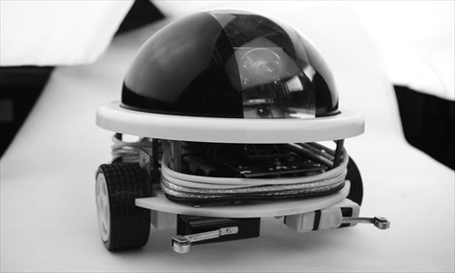 Main: Open Drone's Wi-Fi car on patrol 
Inset: Some members of the Open Drone team Photos: Courtesy of Open Drone 1