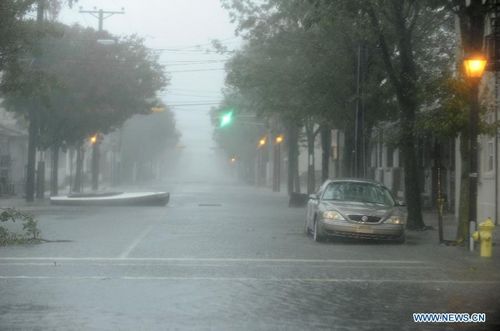 Photo taken on October 29, 2012 shows an empty street in Atlantic City, New Jersey, the United States. Hurricane Sandy is on Monday churning its way towards the US East Coast, poised to make landfall near Atlantic City on Jersey Shore in the evening. The city itself is like a ghost town, with casinos shuttered, tourists fled and many parts of the town inundated in knee-high water. Photo: Xinhua