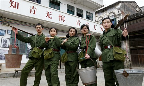 College students volunteer to relive the experience of their elders who were sent to work in the countryside during the Cultural Revolution (1966-76) in Liuzhou, Guangxi Zhuang Autonomous Region on Sunday. Photo: IC