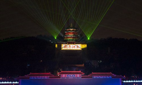 A lightshow illuminates the Summer Palace during a new year countdown event at the Summer Palace in Beijing.  January 1, 2013. Photo: Xinhua