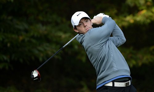 Rory McIlroy of Northern Ireland hits a shot during the second round of  the Korea Open on Friday. Photo: AFP