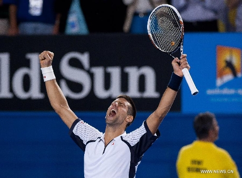 Novak Djokovic of Serbia reacts after winning his men's singles quarterfinals match against Tomas Berdych of Czech Republic at 2013 Australian Open tennis tournament in Melbourne, Australia, Jan. 22, 2013. Novak Djokovic won 3-1. (Xinhua/Bai Xue) 