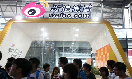 A Sina Weibo stall stands at the Shanghai 2013 Chinajoy Exhibition in July. Photo: IC