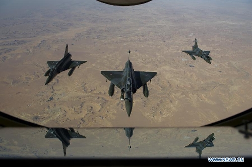A photo released on Jan. 12, 2013 by French Army Communications Audiovisual office (ECPAD) shows French Mirage 2000 D aircrafts flying over Mali overnight January 11 to 12, after taking off from the French military base of N'Djamena in Chad. French President Francois Hollande announce that French forces have launched military intervention on Friday in a support of Malian troops countering Islamist rebels' offensive. (Xinhua/NICOLAS-NELSON RICHARD/ECPAD) 
